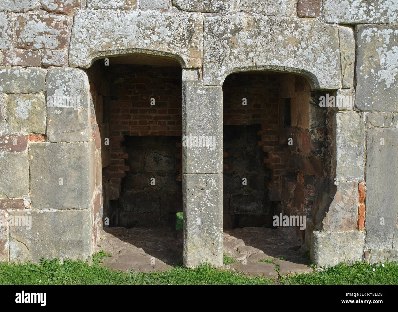 Two stone archways built into an old wall Stock Photo
