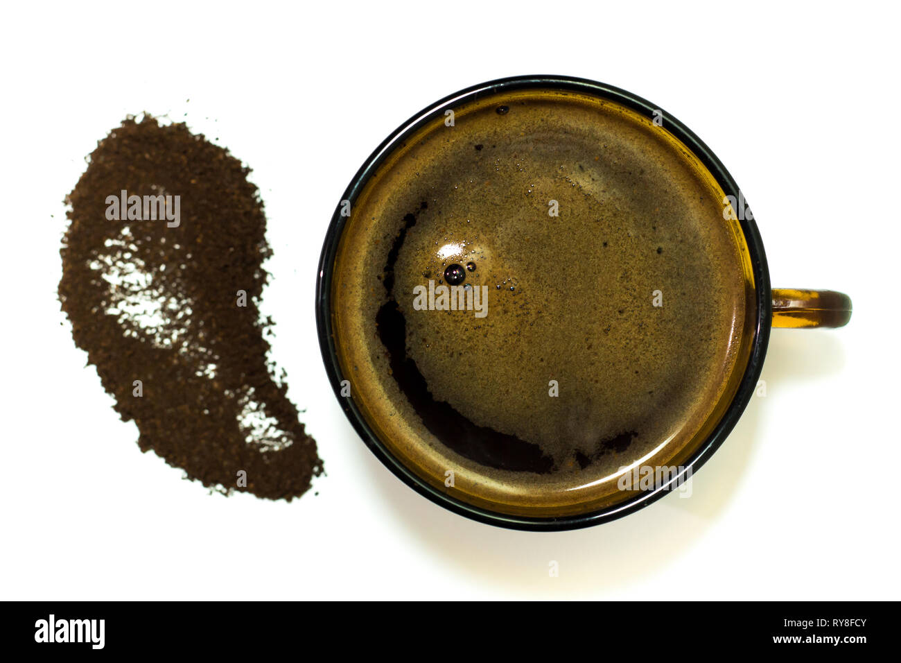 Espresso coffee in a glass dish and coffee powder on the side, isolate on a white background. It looks delicious Stock Photo