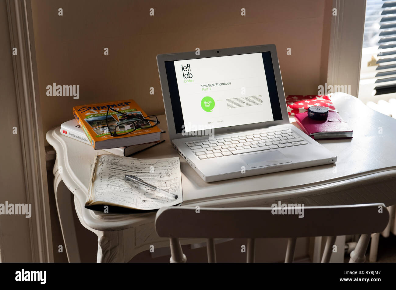 'Laptop on desk at TEFL Lab in London, England' Stock Photo