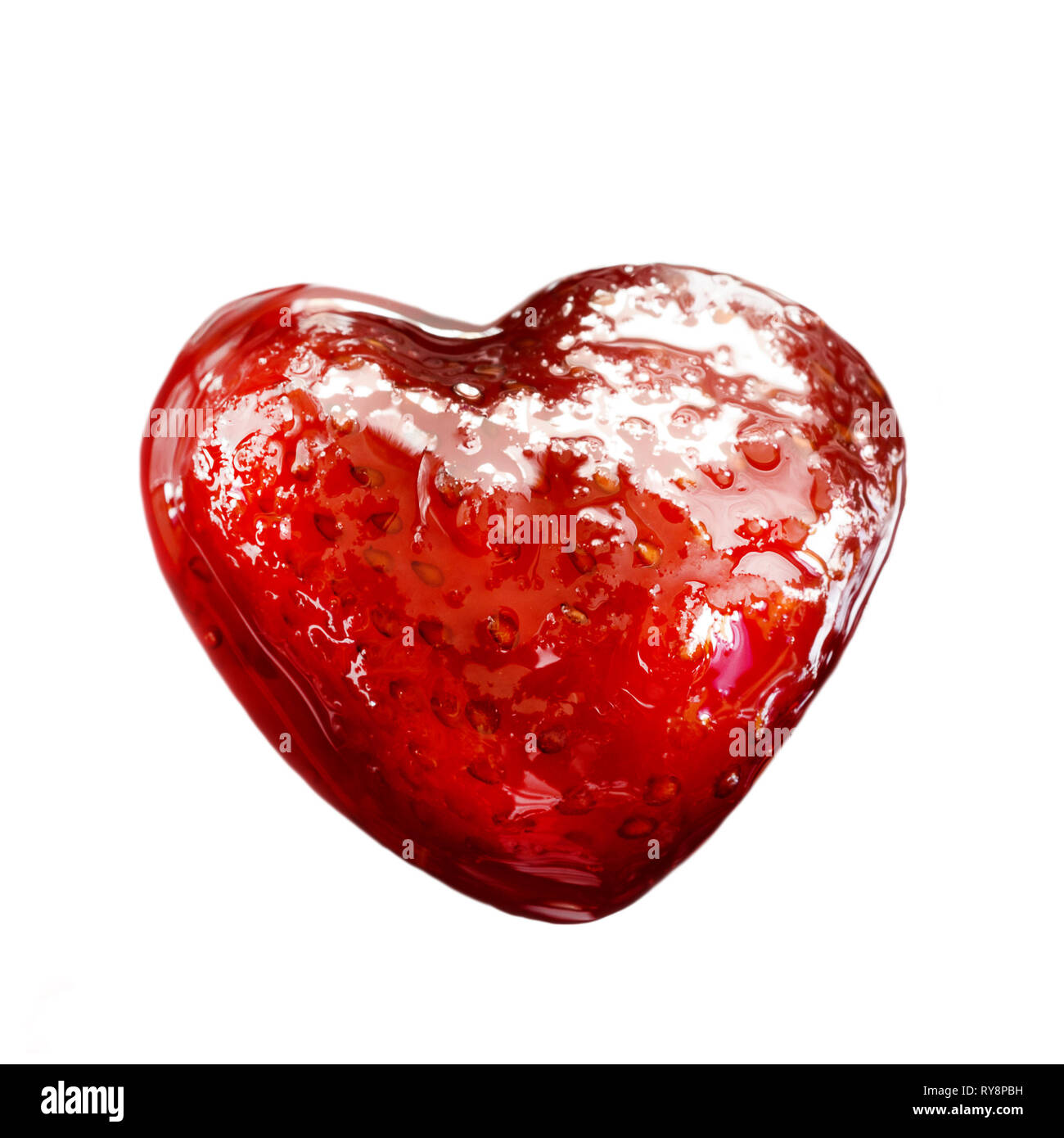 Strawberry jam in a heart shape isolated Stock Photo