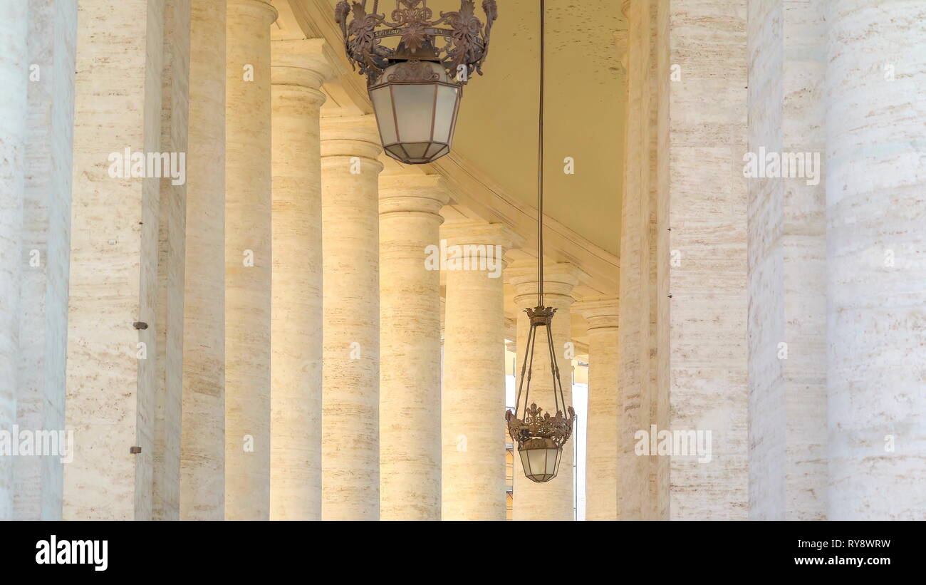 A small hanging lamp inside the temple in Vatican Rome Italy found inside the Basilica of Saint Peter Stock Photo