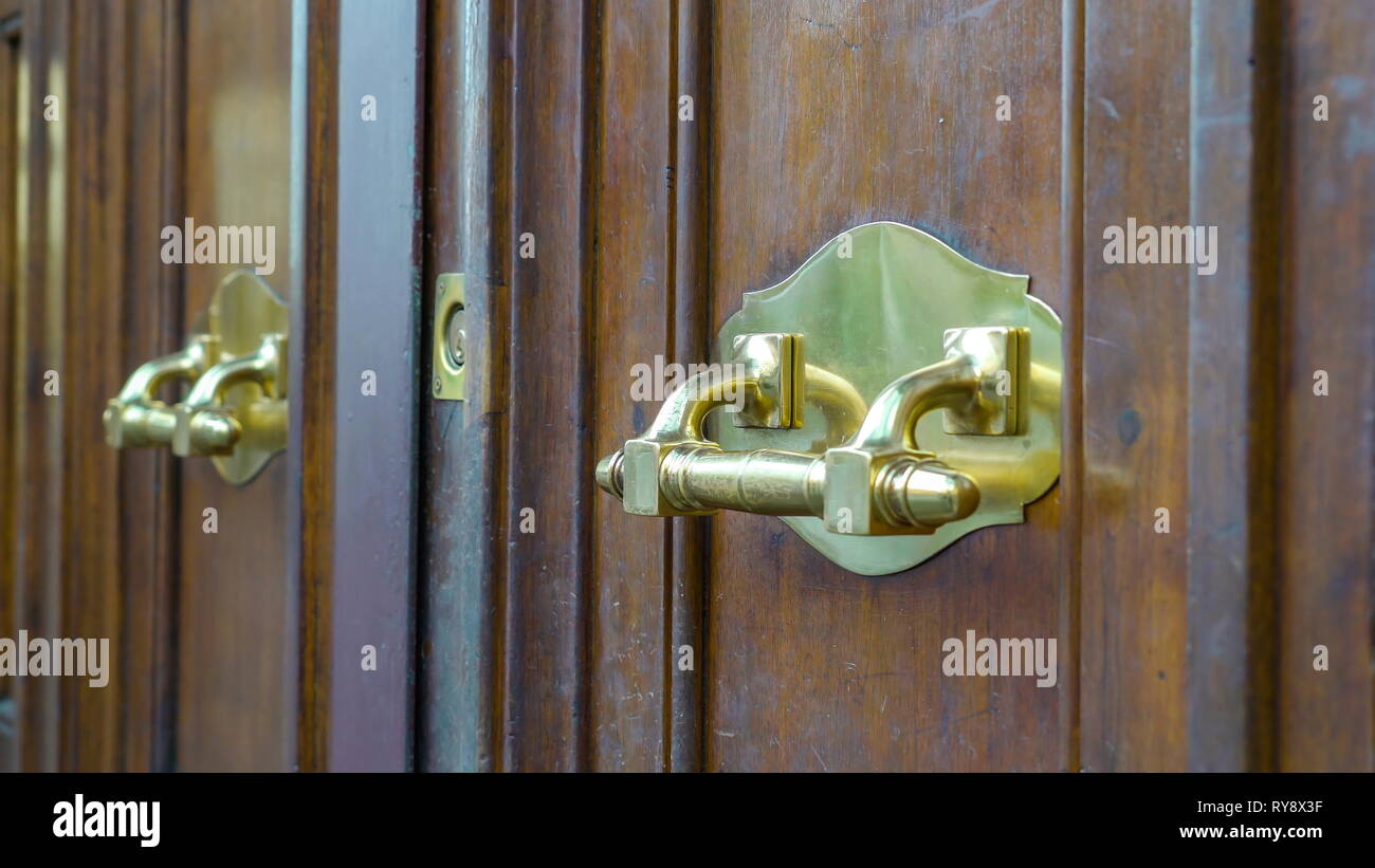 The Golden Door Knob Of A Big Brown Door In Vatican Rome
