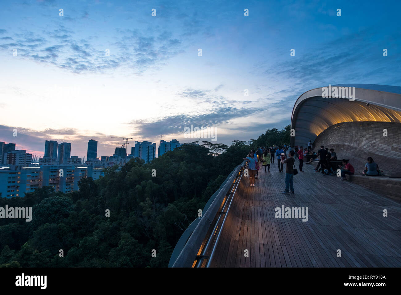 Henderson Waves, Cityscape and Sunset Tourists - Mount Faber Park, Singapore Stock Photo