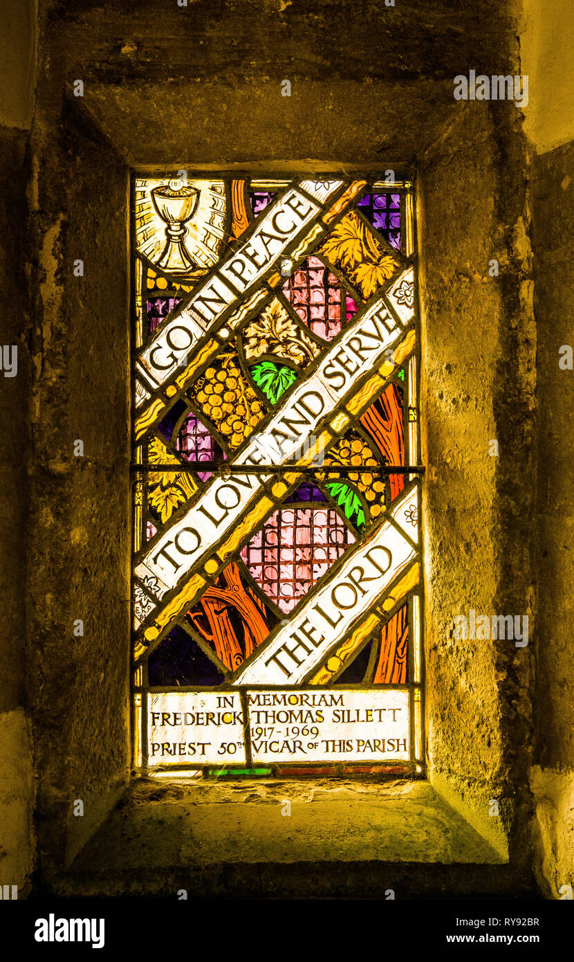 A dedication window in the porch of the church of St Mary the Virgin in Wotton under Edge Gloucestershire Stock Photo