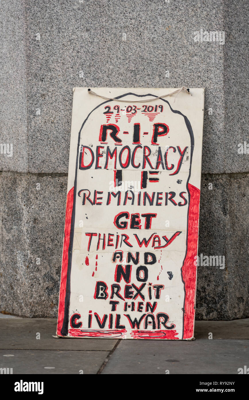 Brexit protest placard. RIP democracy if remainers get their way and no brexit then civil war. Threat of violence. Threatening message Stock Photo