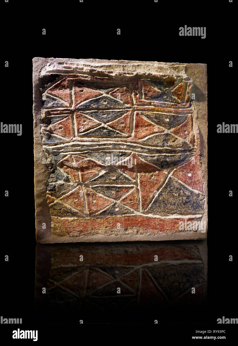 Wall fresco of geometric red and black triangles which appears to be a rug pattern copy. 6000 BC. . Catalhoyuk Collections. Museum of Anatolian Civili Stock Photo