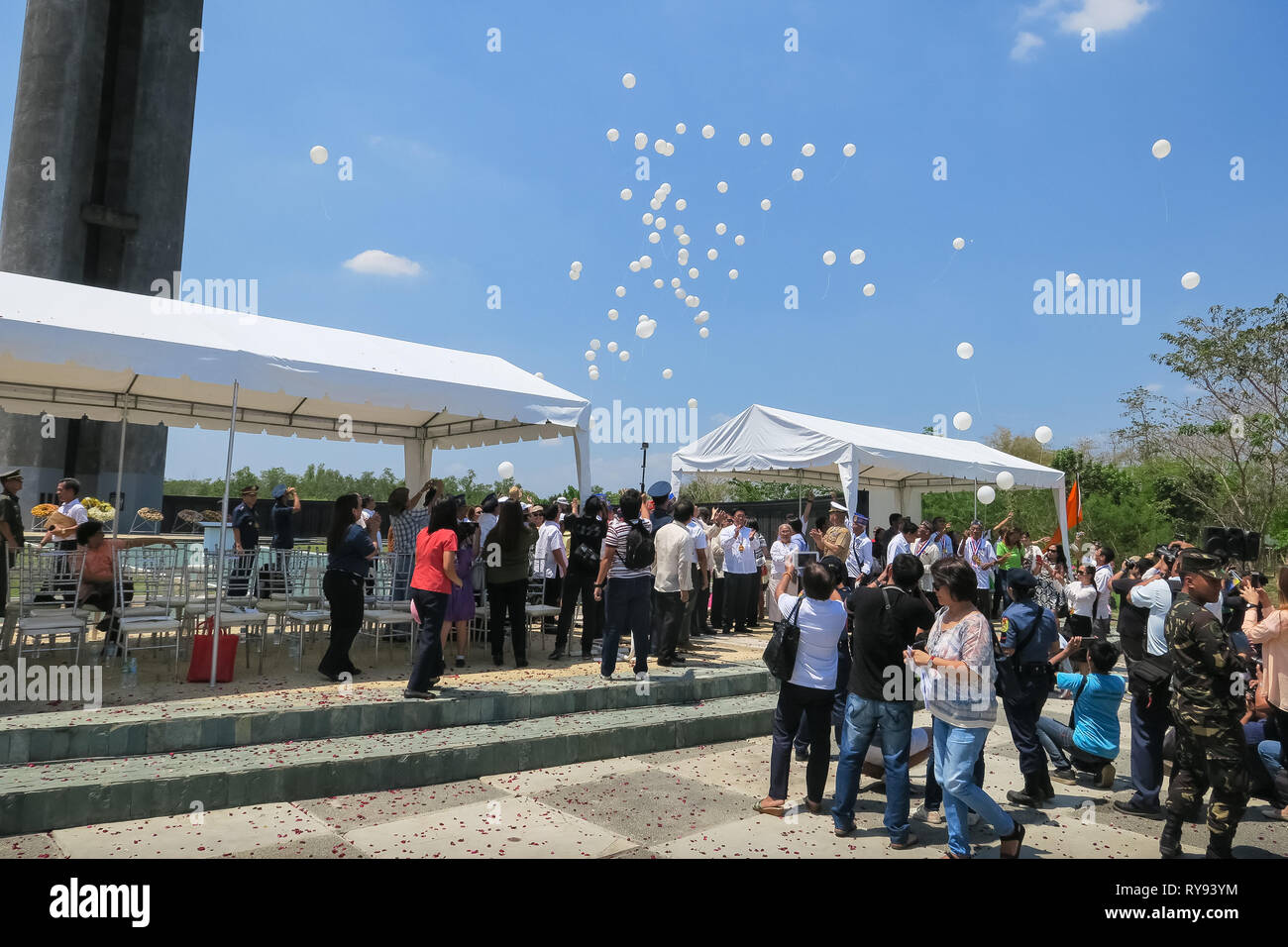 Balloon release over crowd at 74th Bataan Day Anniversary Event - Capas Shrine, Tarlac, Philippines Stock Photo