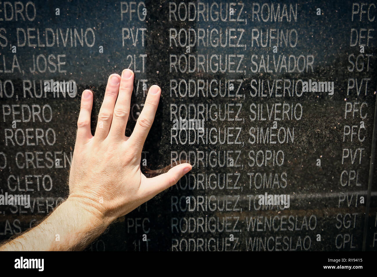 American's Hand on Wall Of Heroes WWII memorial at the Capas Shrine, Tarlac, Philippines Stock Photo