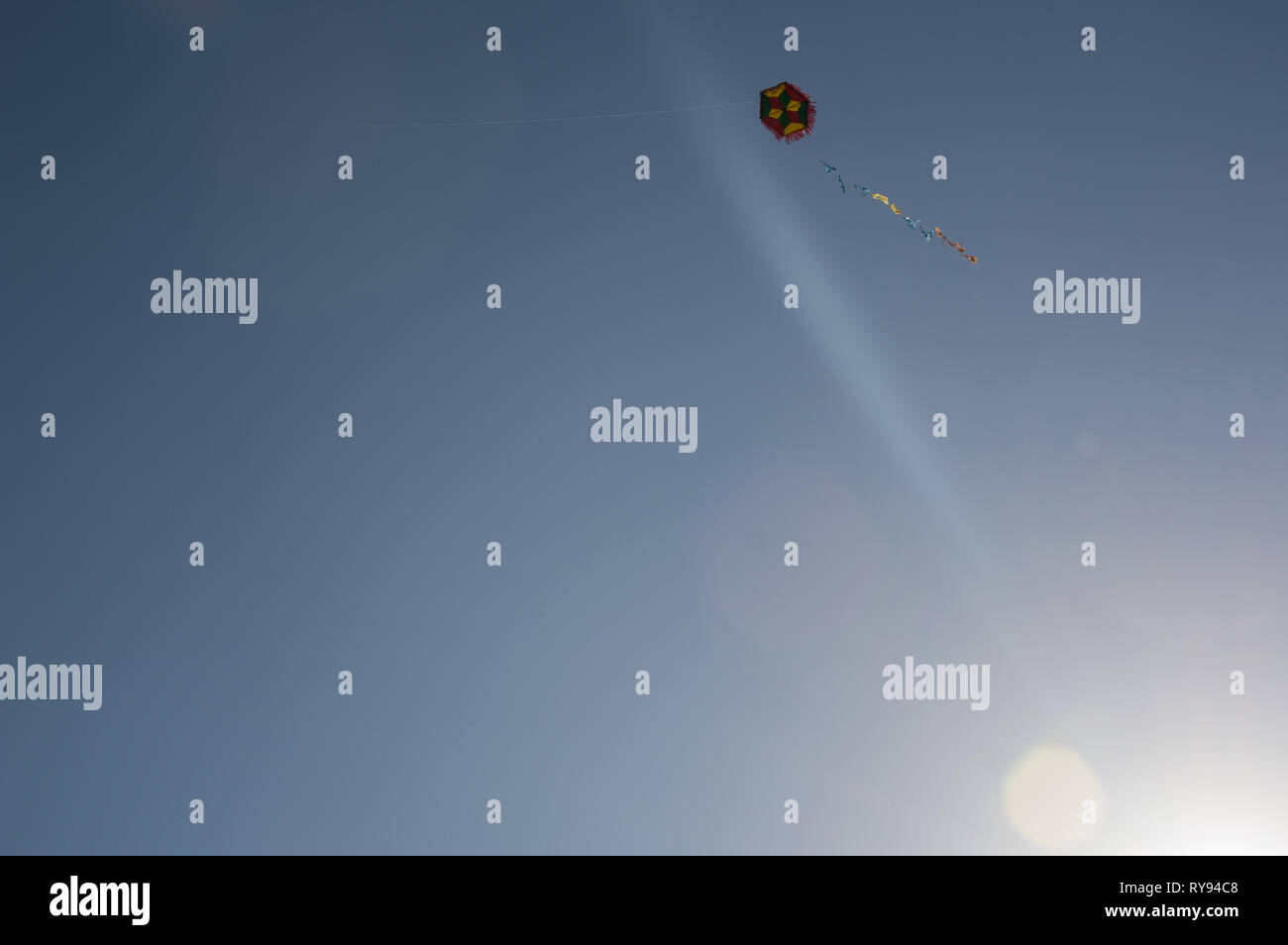 A kite seen flying in the sky. In Clean Monday people are making