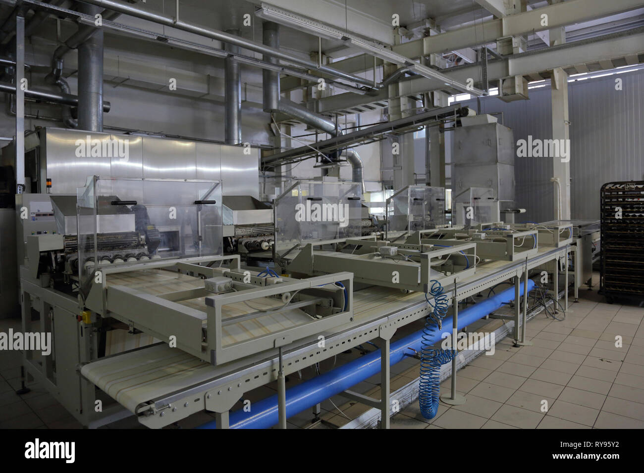 Bread manufacturing equipment in factory Stock Photo
