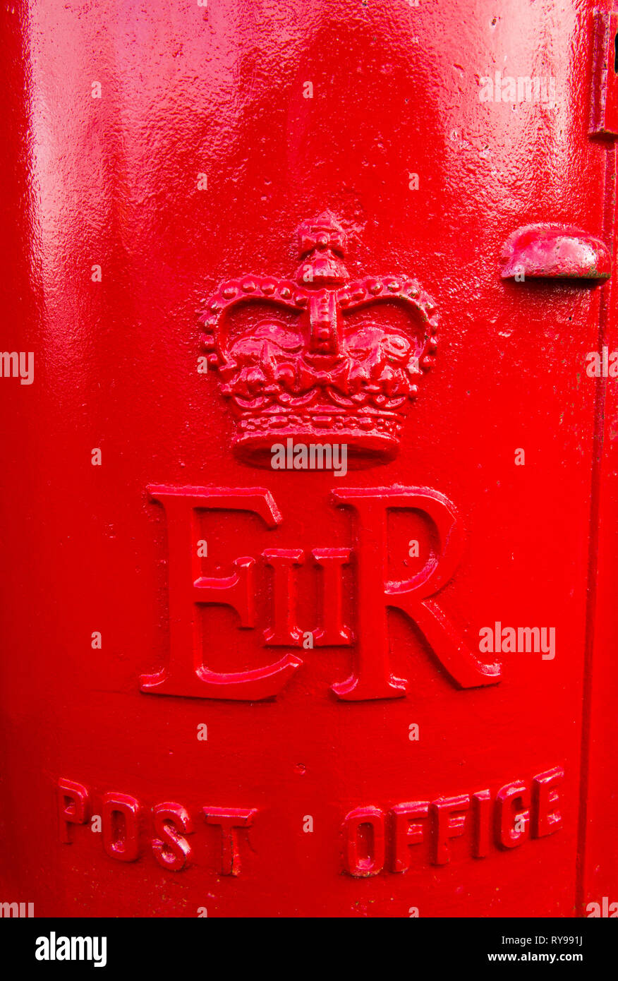 Close Up of a red cylindrical Letter Box on the High Street in Chipping Sodbury South Gloucestershire, South West England, Stock Photo