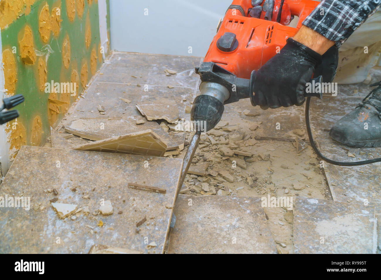 Removal of old floor during a renovation of housing from demolition