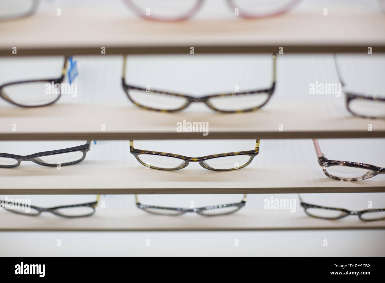 Glasses on a shelf hires stock photography and images Alamy