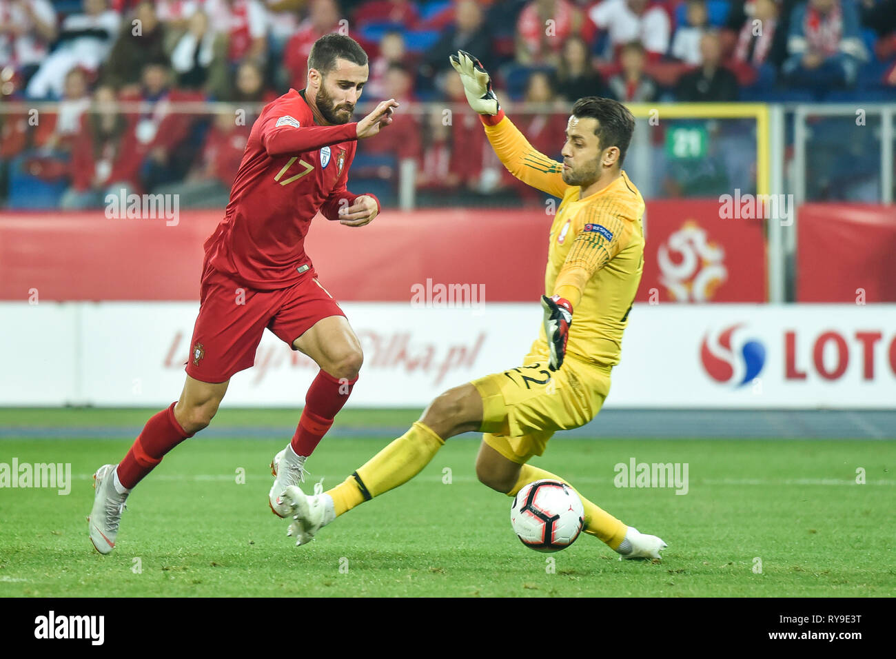 CHORZOW, POLAND - OCTOBER 11, 2018: Football Nations League division A group 3 match Poland vs Portugal 2:3. In action Rafa Silva and goalkeeper Lukas Stock Photo