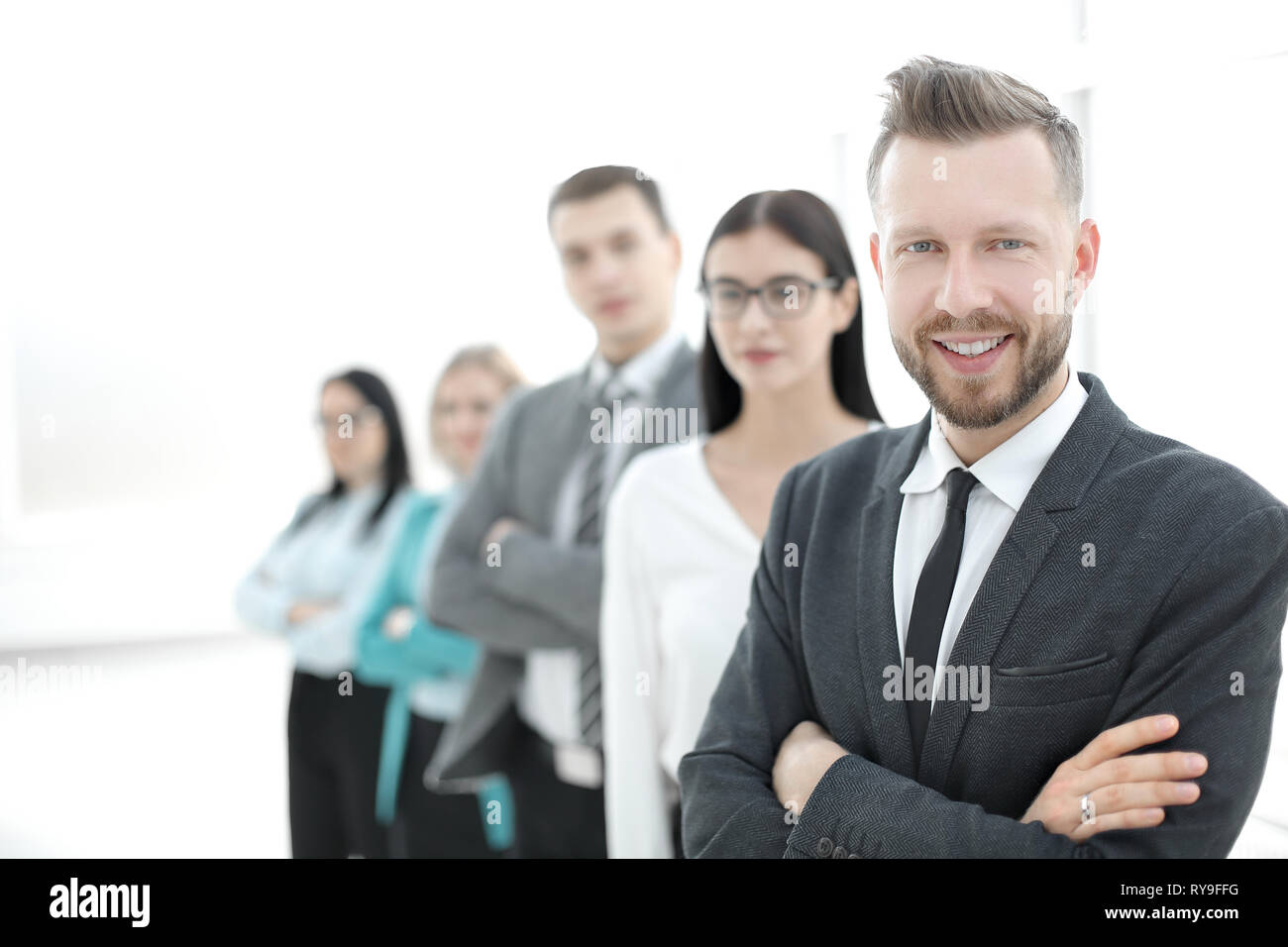 confident businessman standing in front of his business team Stock ...