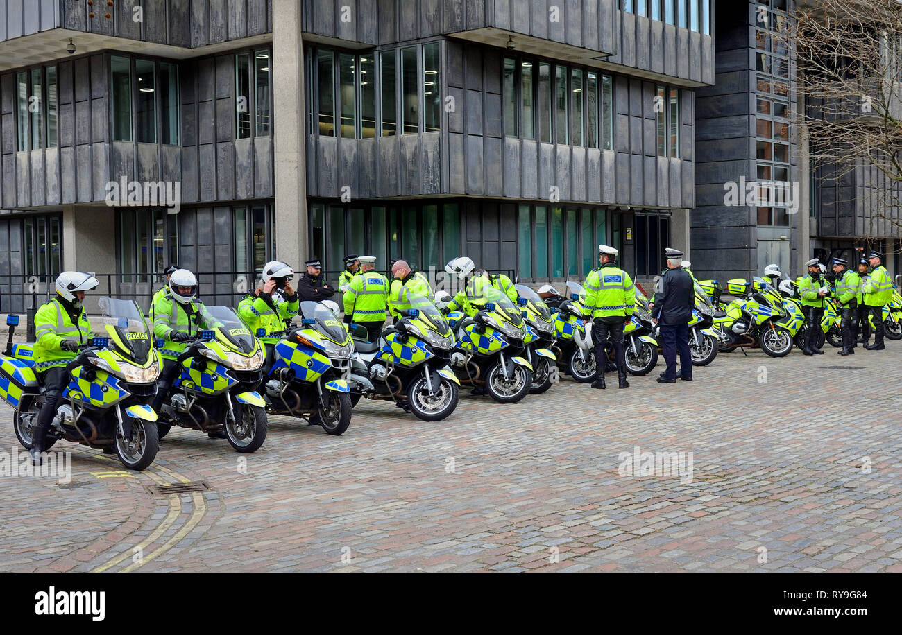 London, England, UK. Police motorcyclist lined up outside the QEII Conference Centre in Westminster Stock Photo