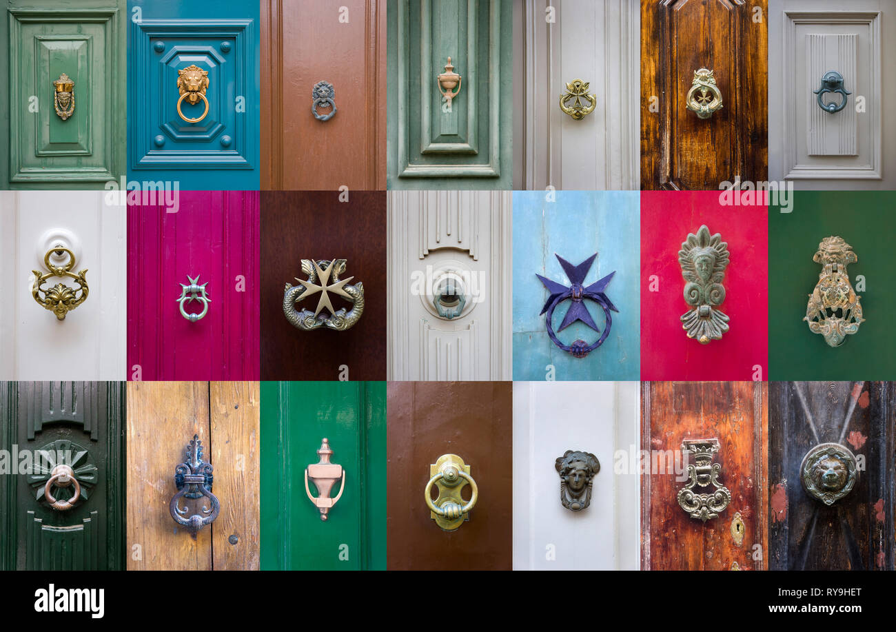 Set of decorative door knockers on a wooden doors from Malta Stock