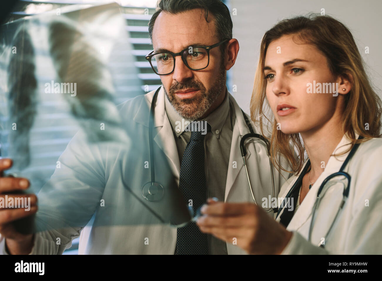 Doctor studying x ray hires stock photography and images Alamy