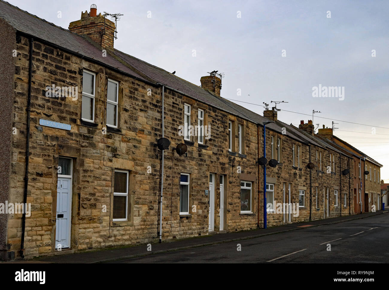 Terraced housing Lawson Street Amble   Amble is a small town on the north east coast of Northumberland in North East England. Cw 6654 It was a form Stock Photo