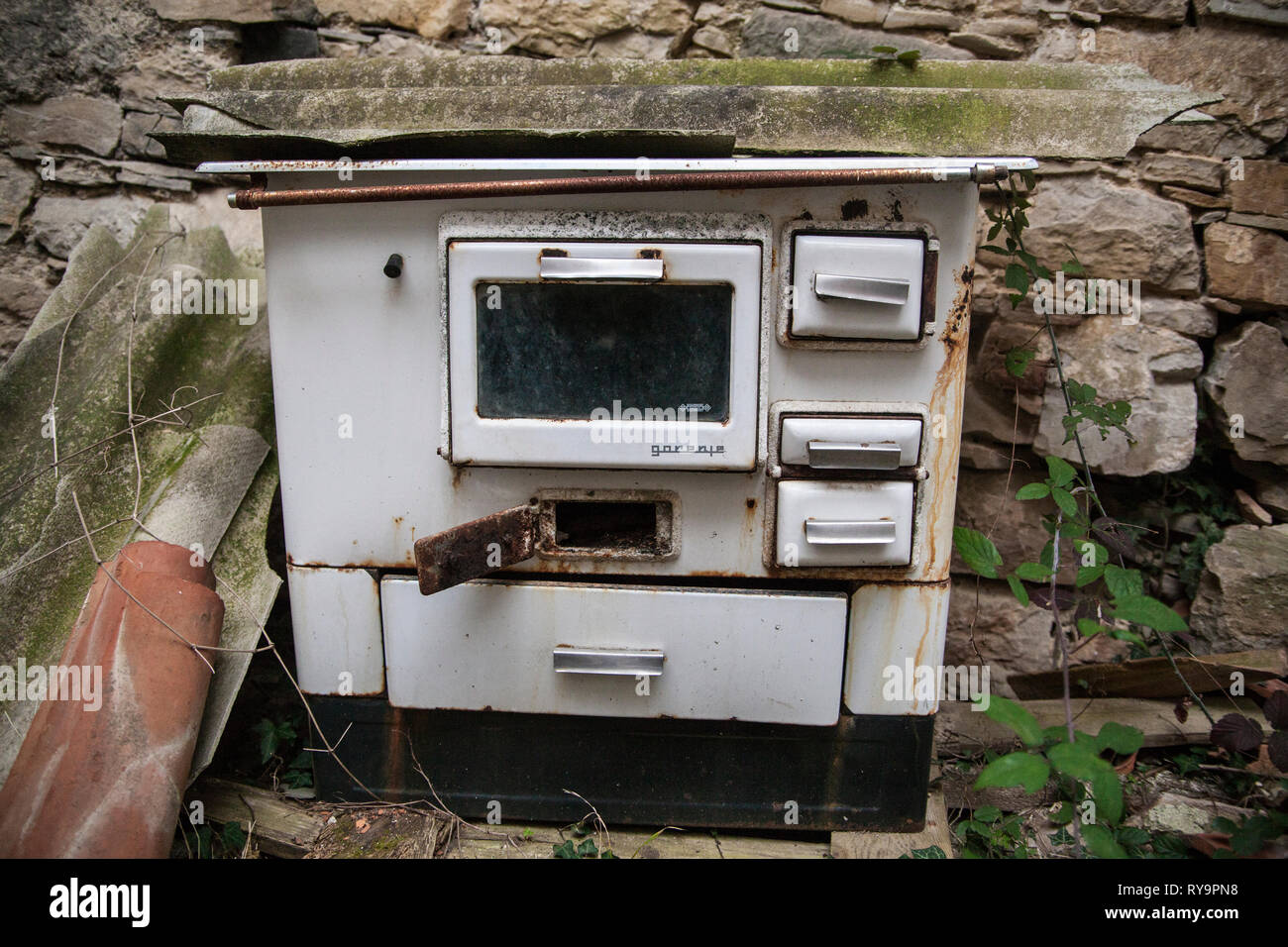 Abandoned stove in an abandoned village Slapnik in region Goriška Brda, Slovenia. Stock Photo