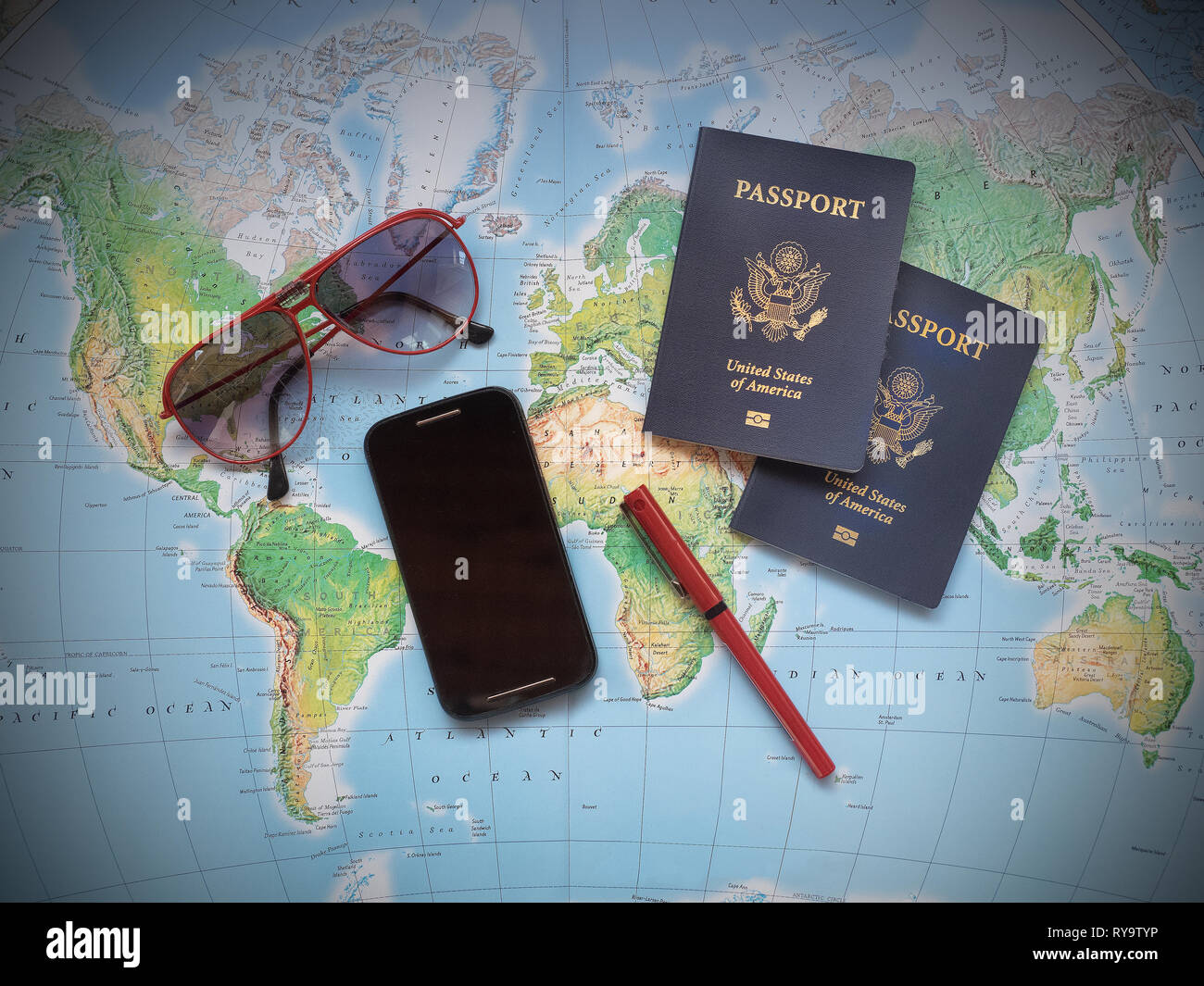 Passports on vacation travel map Stock Photo