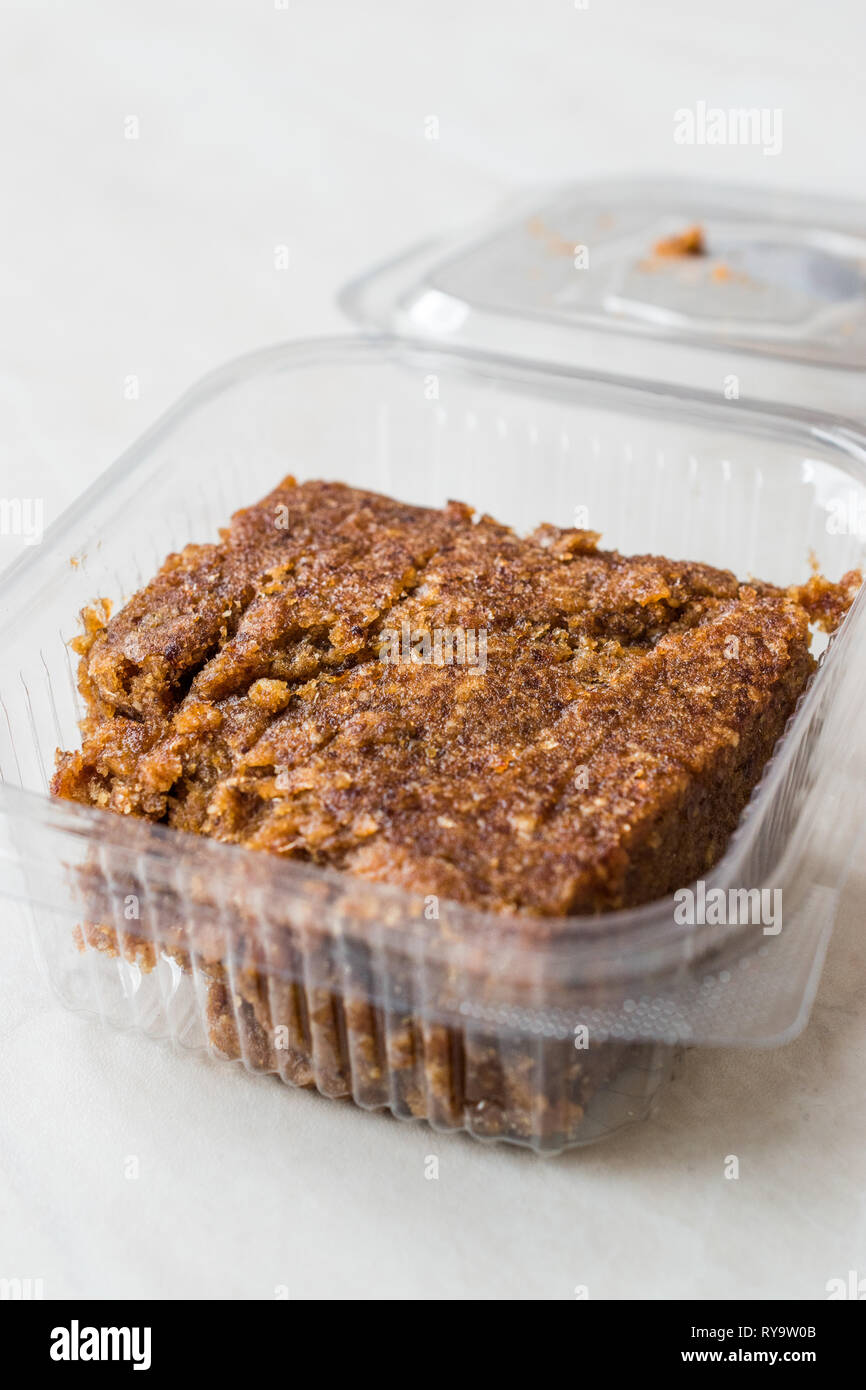Organic Date Fruit Paste Dough in Plastic Box Container / Package for Breakfast. Stock Photo