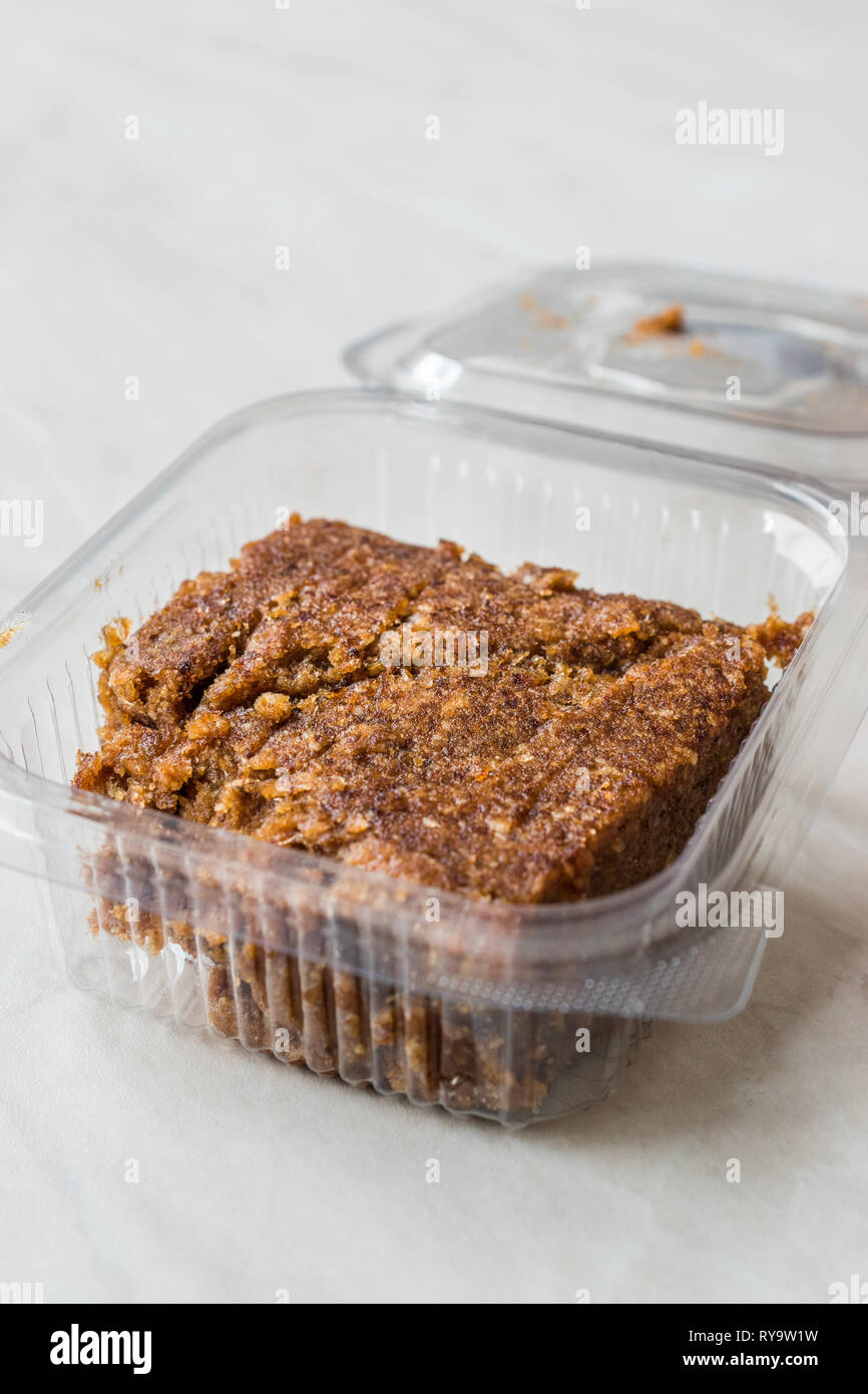 Organic Date Fruit Paste Dough in Plastic Box Container / Package for Breakfast. Stock Photo
