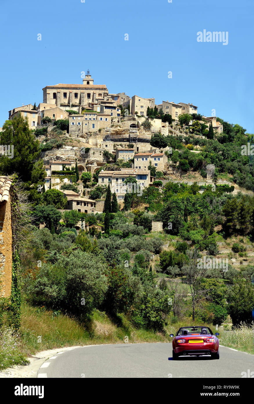 View At Menerbes In The Luberon France With A Sports Car On The Road Leading To The Village Stock Photo Alamy