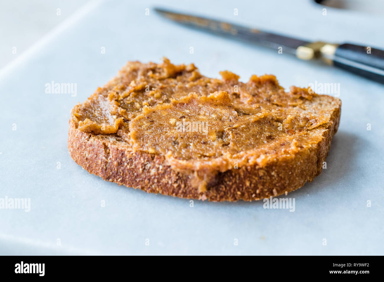 Organic Date Fruit Paste Dough with Bread. for Breakfast. Stock Photo