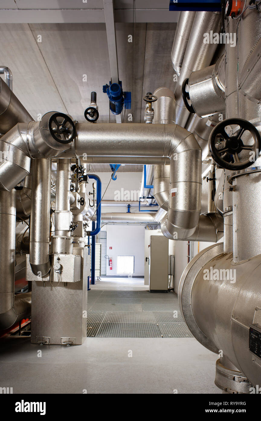 Silver machinery in factory Stock Photo