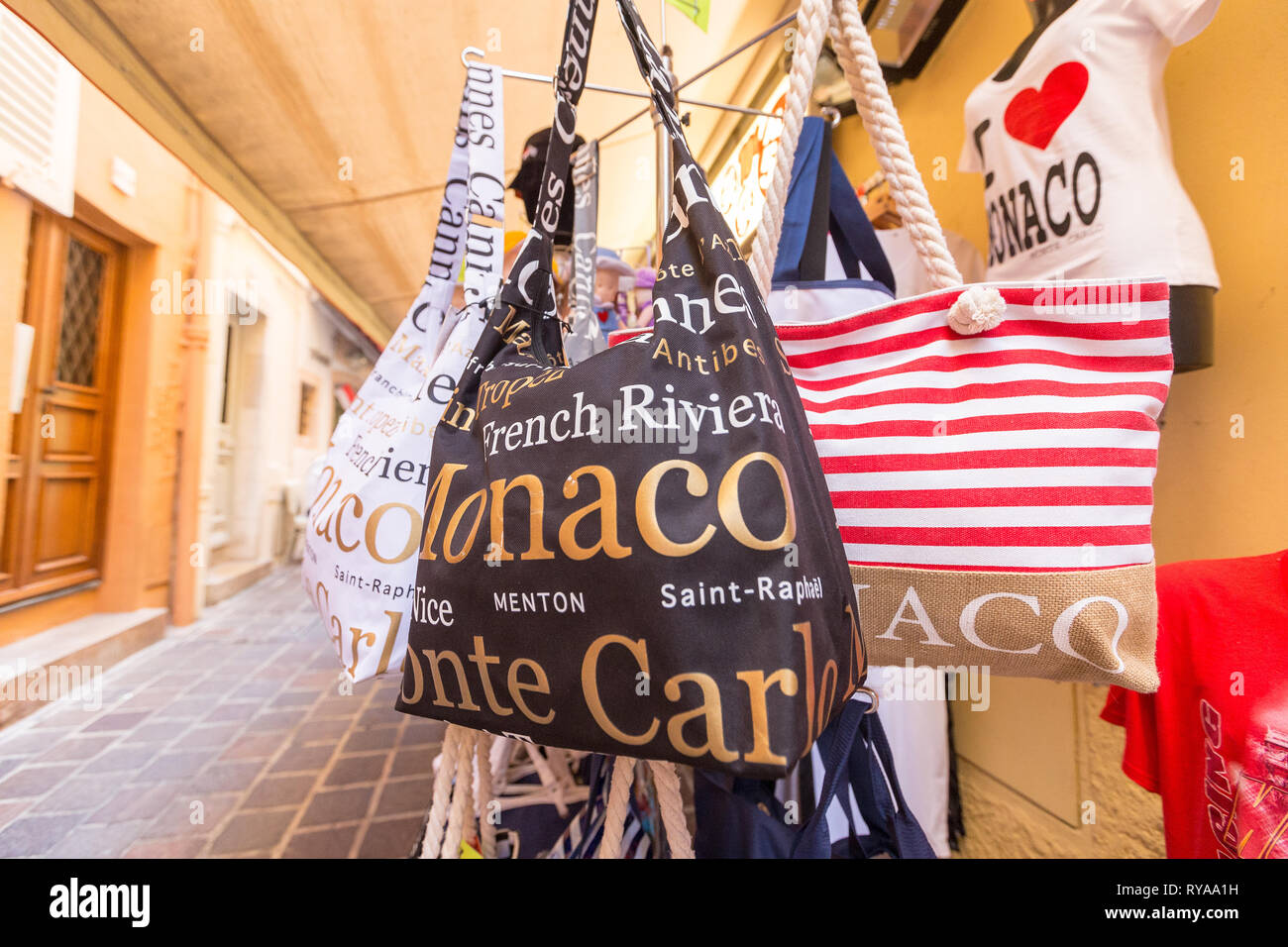 Taschen mit Schriftzug 'Monaco' als Souvenir fuer Touristen in Monte Carlo, Monaco, 29.08.2018 Bildnachweis: Mario Hommes / HH-Photography Stock Photo
