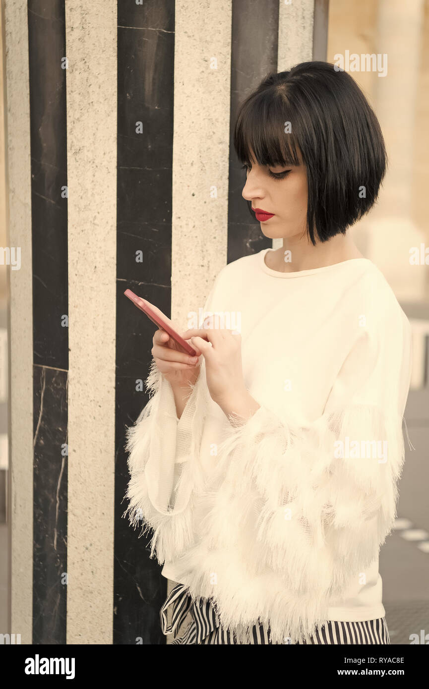 Date canceled send message. Girl fashionable lady with bob hairstyle texting smartphone outdoor urban background. Woman fashionable model posing outdo Stock Photo - Alamy Date canceled send message. Girl fashionable lady with bob hairstyle texting smartphone outdoor urban background. Woman fashionable model posing outdo Stock Photo - Alamy