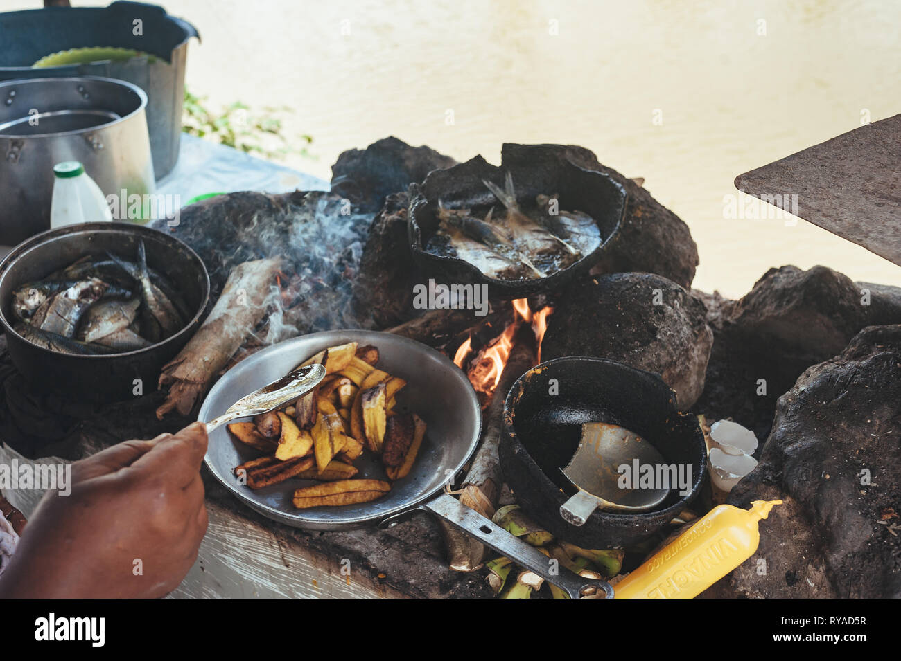 Cooking on an open fire. Cooking dinner in field conditions at the