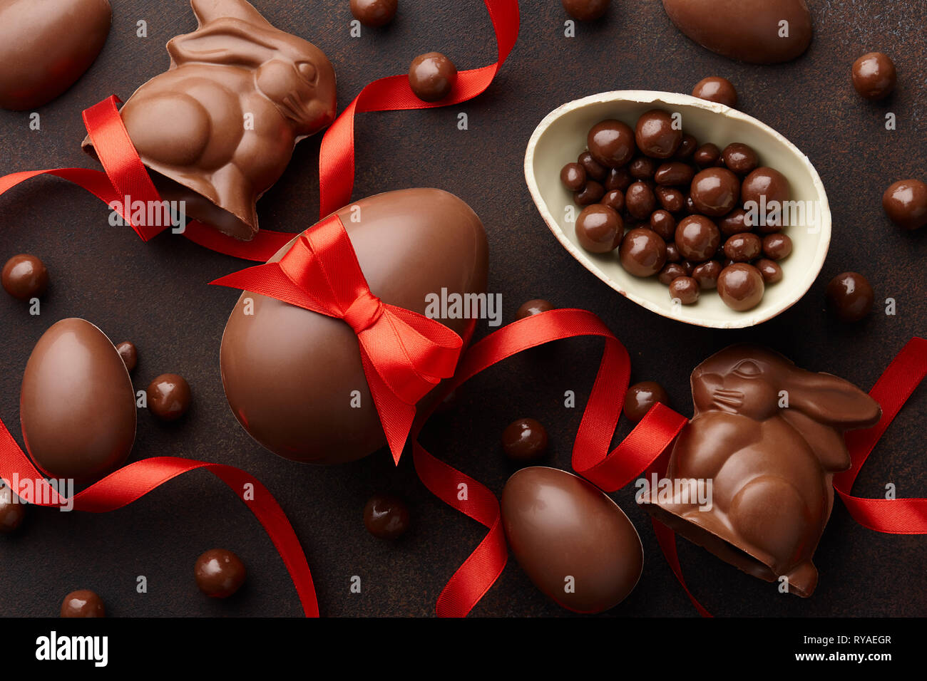 Easter composition with chocolate eggs and bunnies Stock Photo