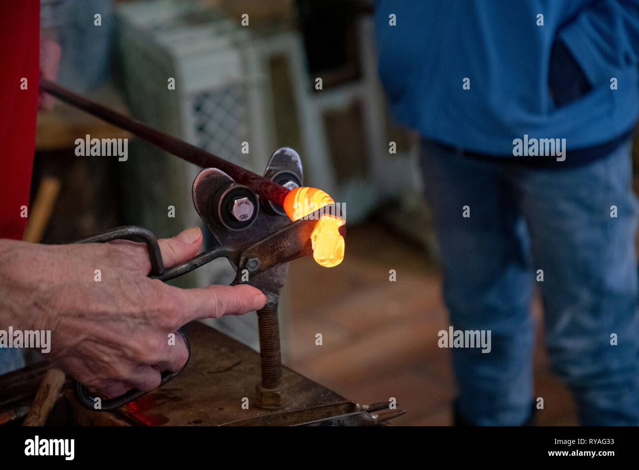 blowing glass liquid glass is cut off with scissors Stock Photo Alamy