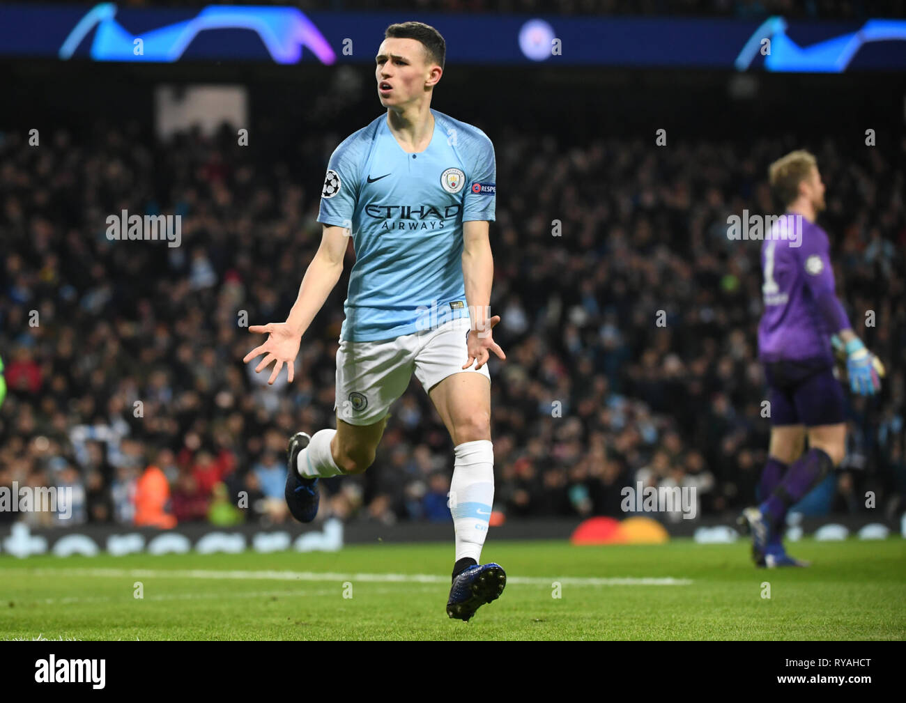 Manchester, UK. 12th Mar, 2019. Soccer: Champions League, knockout round, round of sixteen, second leg: Manchester City - FC Schalke 04 in Ethiad Stadium. Manchester's Phil Foden cheers after scoring 6-0 for his team. Credit: Ina Fassbender/dpa/Alamy Live News Stock Photo