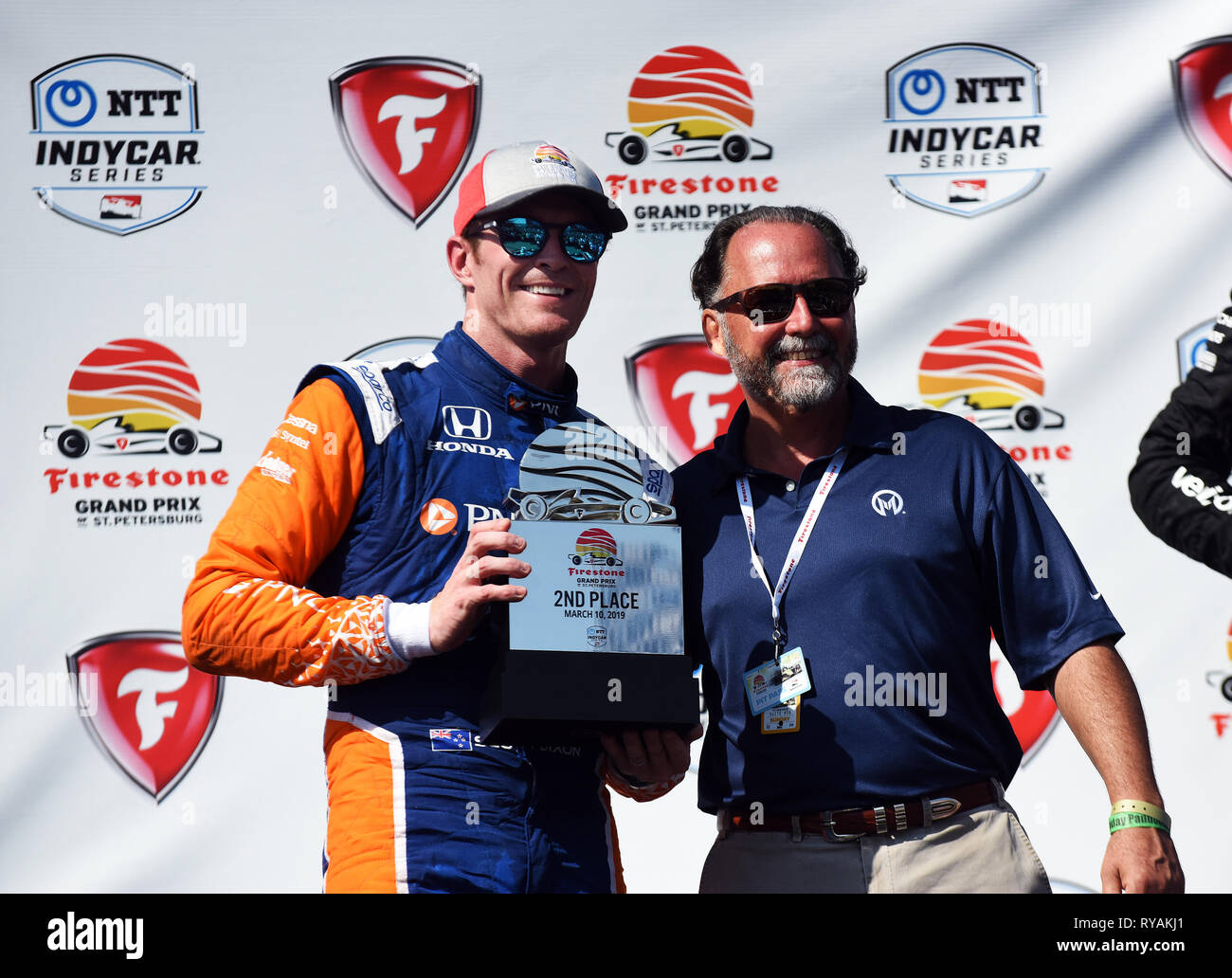 March 10, 2019 - St. Petersburg, Florida, United States - Chip Ganassi Racing driver Scott Dixon of New Zealand holds the second place trophy at the Firestone Grand Prix of St. Petersburg on March 10, 2019 in St. Petersburg, Florida. Josef Newgarden of the United States won the race. (Paul Hennessy/Alamy) Stock Photo
