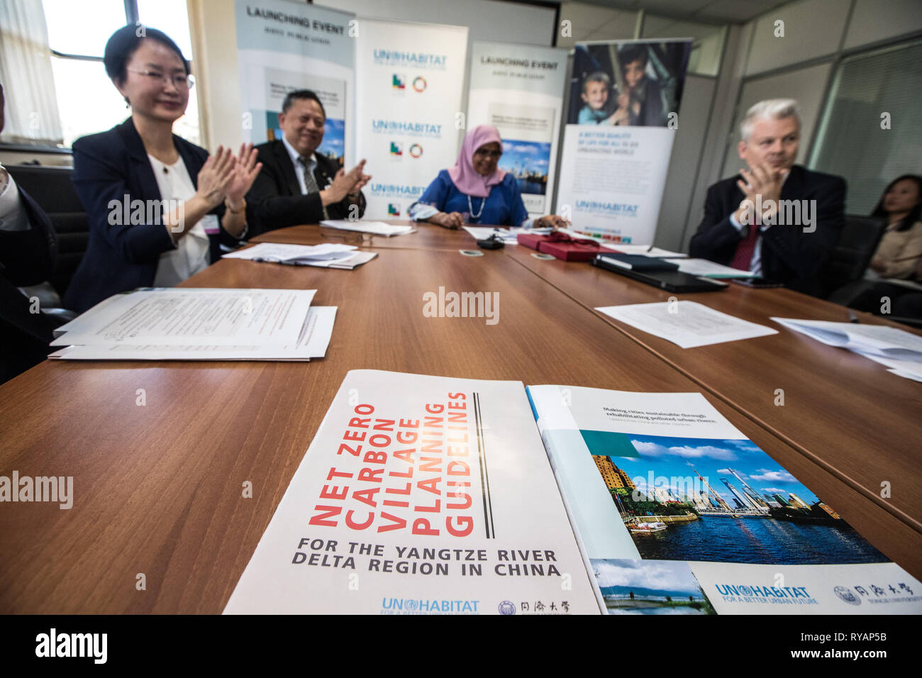(190313) -- NAIROBI, March 13, 2019 (Xinhua) -- Photo taken on March 12, 2019 shows the launch of a publication titled 'Making cities sustainable through rehabilitating polluted urban rivers: Lessons from China and other countries', which was co-authored by the UN Human Settlement Programme (UN-Habitat) and China's Tongji University, in Nairobi, Kenya. The publication was launched on the sidelines of the fourth session of the UN Environment Assembly (UNEA4) underway in Nairobi.The UN-Habitat has also partnered with Tongji University to develop a net zero carbon village guideline for China's Ya Stock Photo