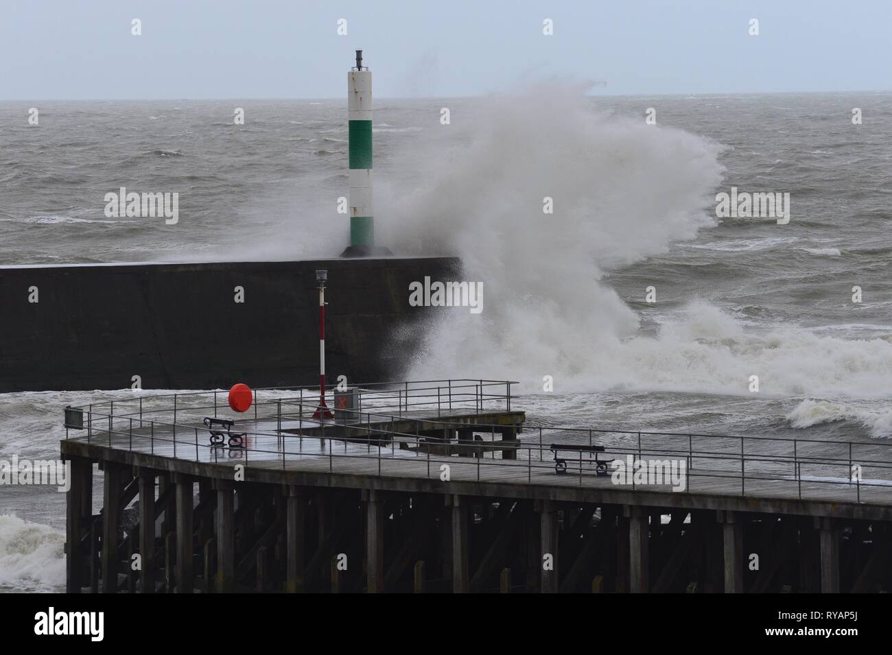 Aberystwyth Ceredigion Wales UK, Wednesday 13 March 2019. UK Weather: Storm Gareth, the latest named storm of the season, hits the seafront in Aberystwyth. The gale force winds of Storm Gareth are expected to bring damaging 70mph gusts to exposed Irish Sea coasts today. photo Credit: Keith Morris/Alamy Live News Stock Photo