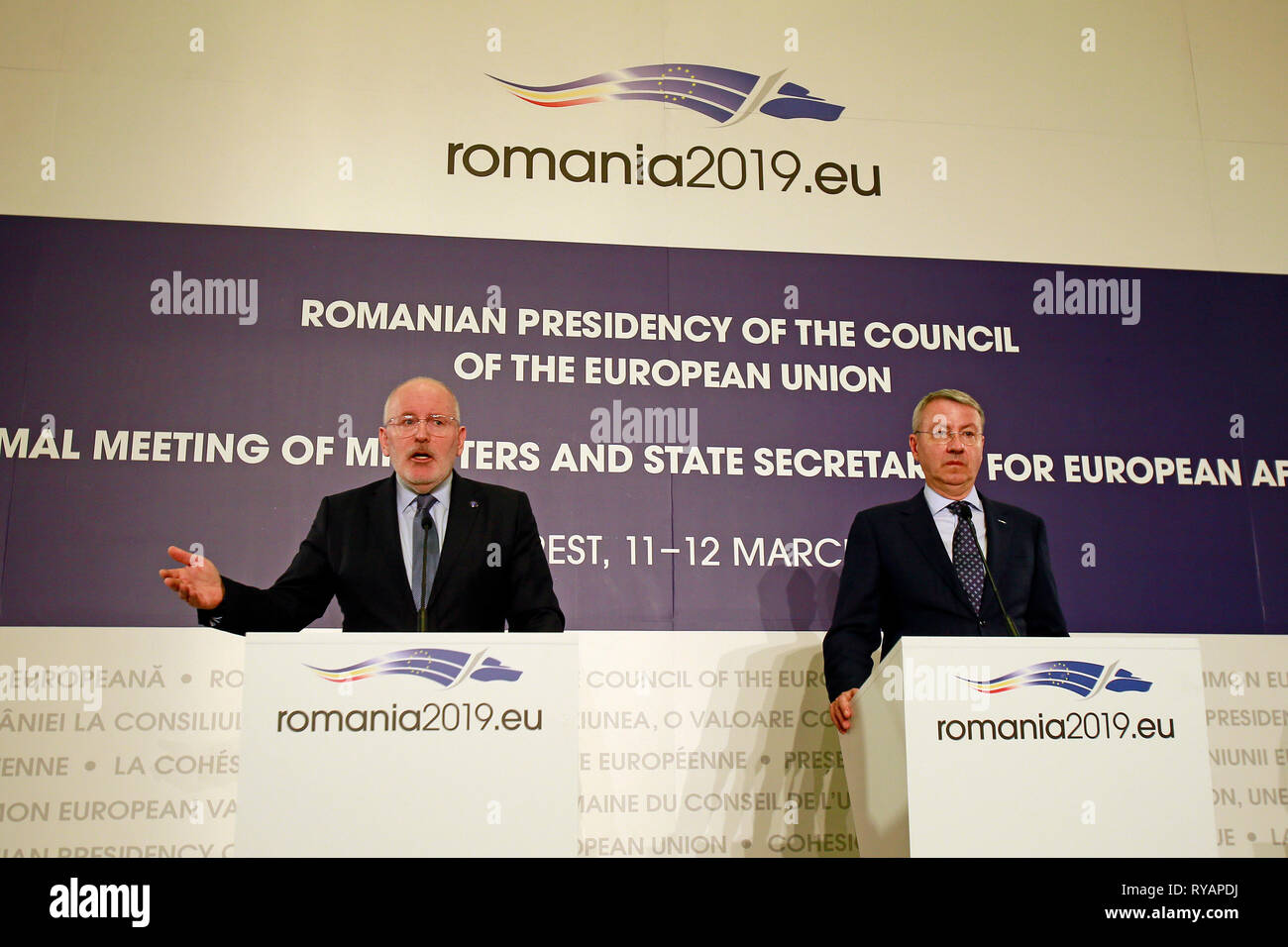 (190313) -- BUCHAREST, March 13, 2019 (Xinhua) -- First Vice-President of the European Commission Frans Timmermans (L) attends a joint news conference with the Romanian Minister for European Affairs George Ciamba in Bucharest, Romania, March 12, 2019. The future Multiannual Financial Framework of the European Union (EU) must respond both to the priorities of the EU and to the unexpected new challenges, Timmermans said here on Tuesday. (Xinhua/Cristian Cristel) Stock Photo