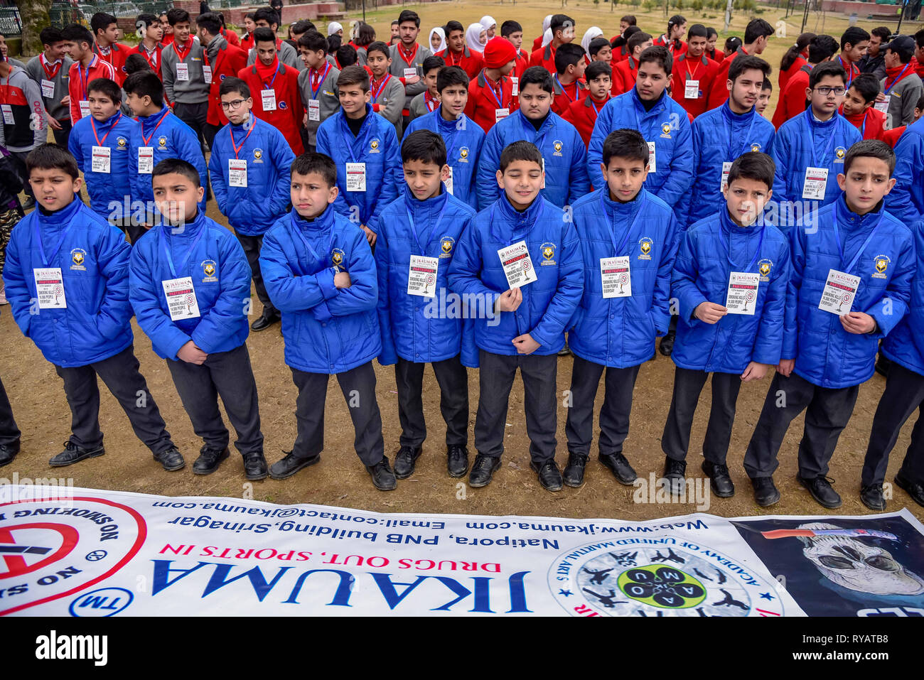 Srinagar, Jammu and Kashmir, India. 13th Mar, 2019. Kashmiri students are seen participating in a rally marking No Smoking Day in Srinagar.No Smoking Day is observed every year on the second Wednesday of March. Credit: Idrees Abbas/SOPA Images/ZUMA Wire/Alamy Live News Stock Photo