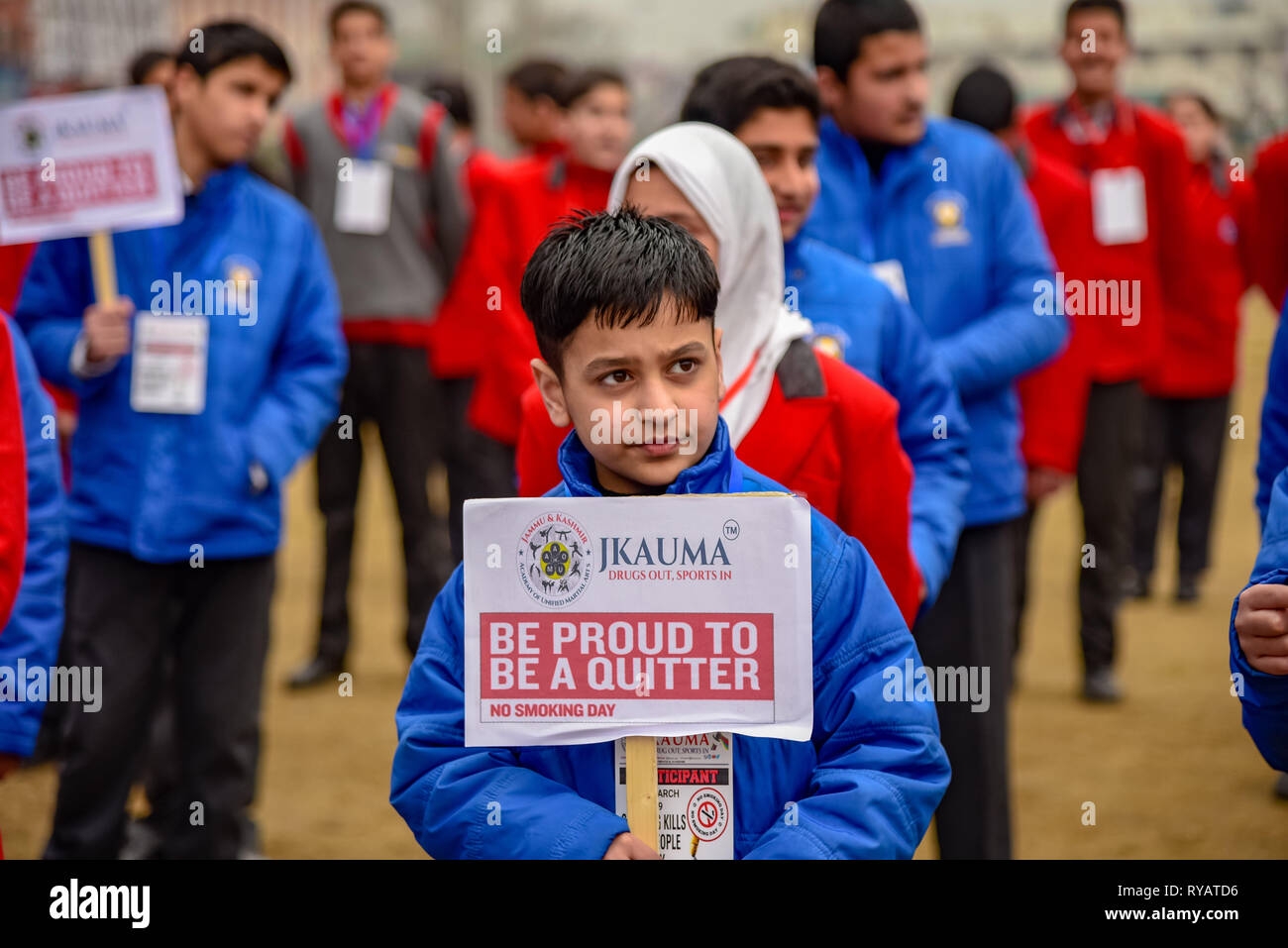 Srinagar, Jammu and Kashmir, India. 13th Mar, 2019. Kashmiri students seen holding placards during a rally marking No Smoking Day in Srinagar.No Smoking Day is observed every year on the second Wednesday of March. Credit: Idrees Abbas/SOPA Images/ZUMA Wire/Alamy Live News Stock Photo