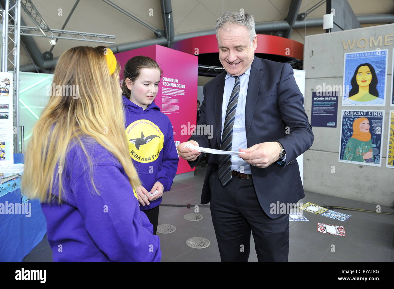 Glasgow, UK. 13 March 2019.  Mr Lochhead will meets P5 and P6 pupils from Sunnyside Primary School showcasing an environmental campaign they have created, as well as viewing exhibits from companies from across the Science, Technology, Engineering and Mathematics (STEM) industry.  Funding for Scotland’s four science centres will be announced during British Science Week.  Scotland is the only part of the UK where science centres are supported through annual funding. Minister for Science Richard Lochhead will unveils more funding. Stock Photo