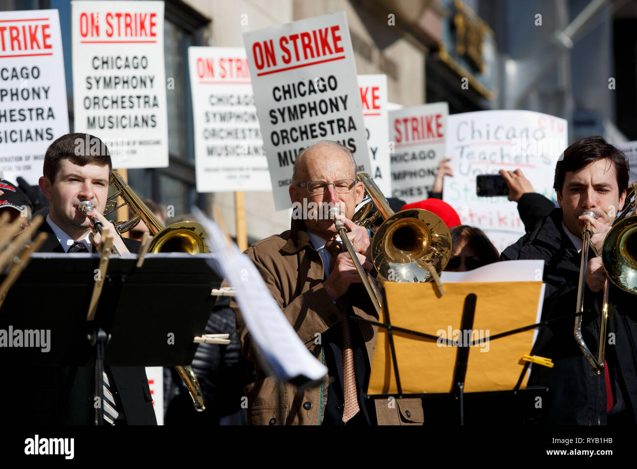 Chicago, USA. 12th Mar, 2019. Musicians of the Chicago Symphony Orchestra  (CSO) and other supporters participate in a strike in Chicago, the United  States, on March 12, 2019. The CSO musicians went