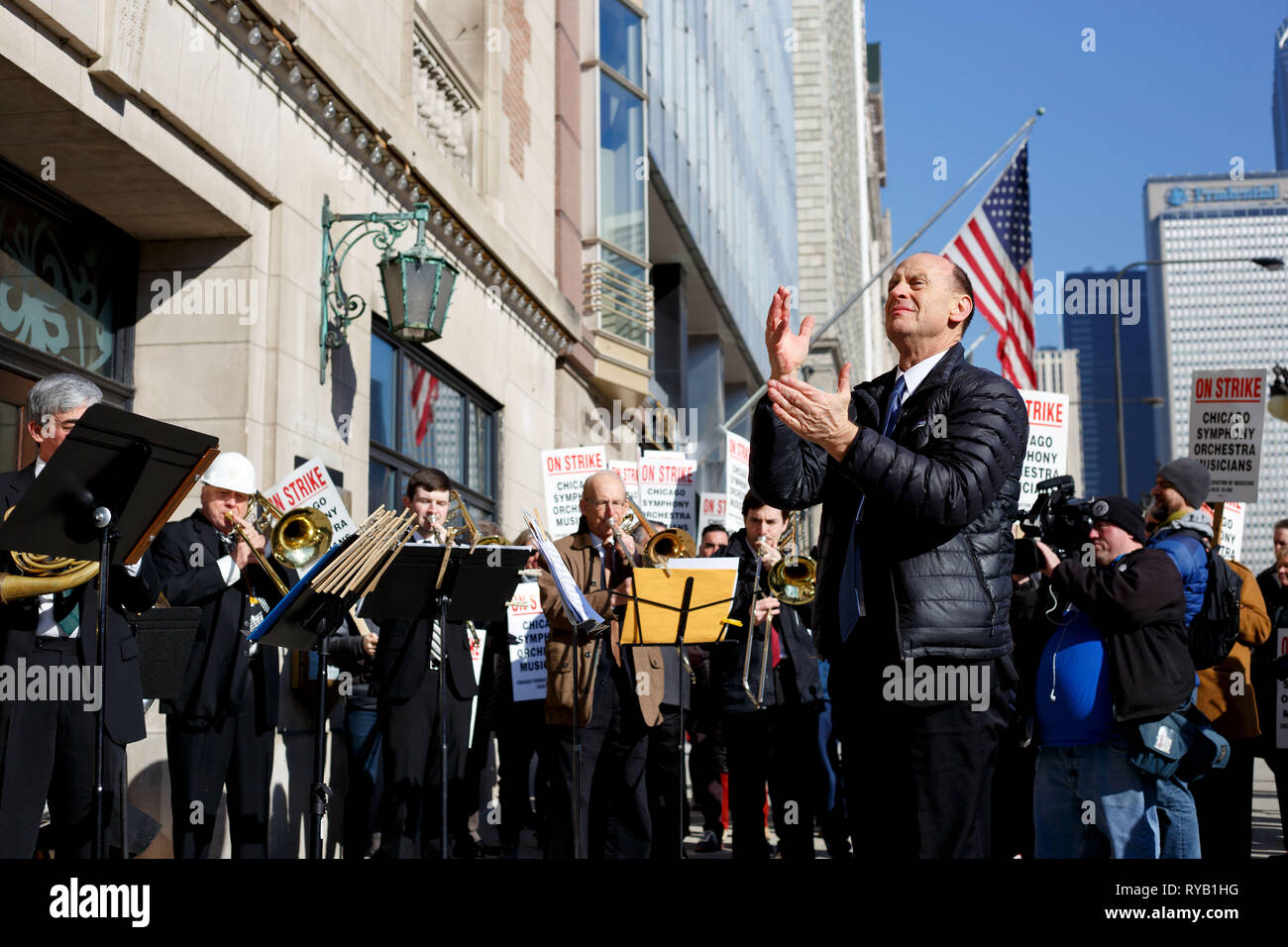Chicago, USA. 12th Mar, 2019. Musicians of the Chicago Symphony Orchestra  (CSO) and other supporters participate in a strike in Chicago, the United  States, on March 12, 2019. The CSO musicians went