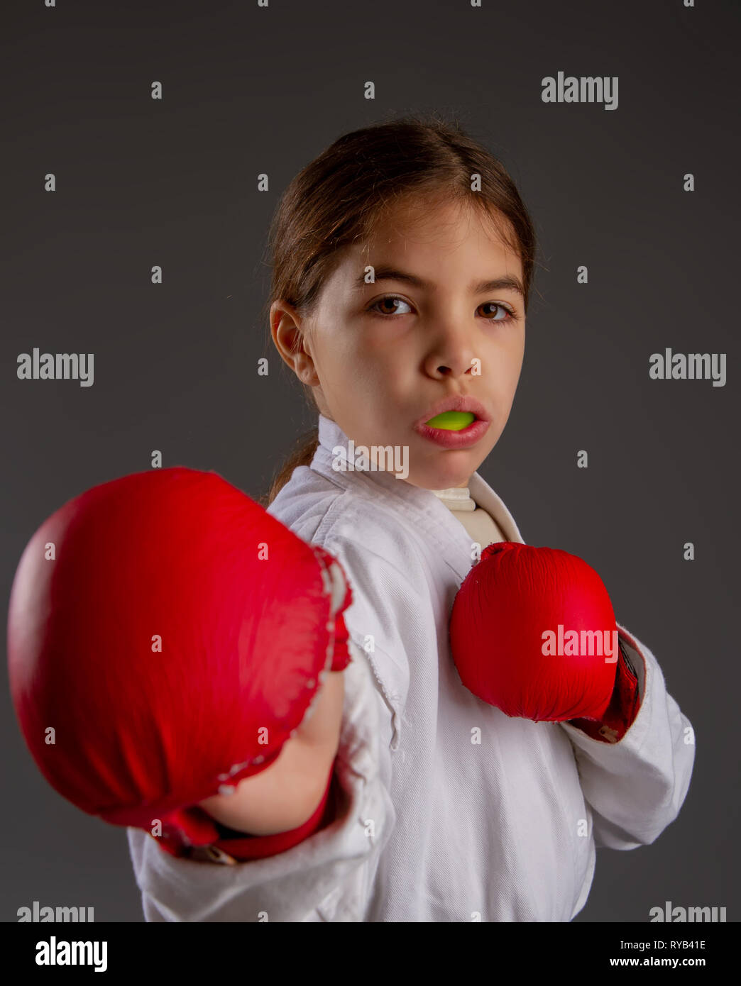 Girl with a protective mouth guard Stock Photo