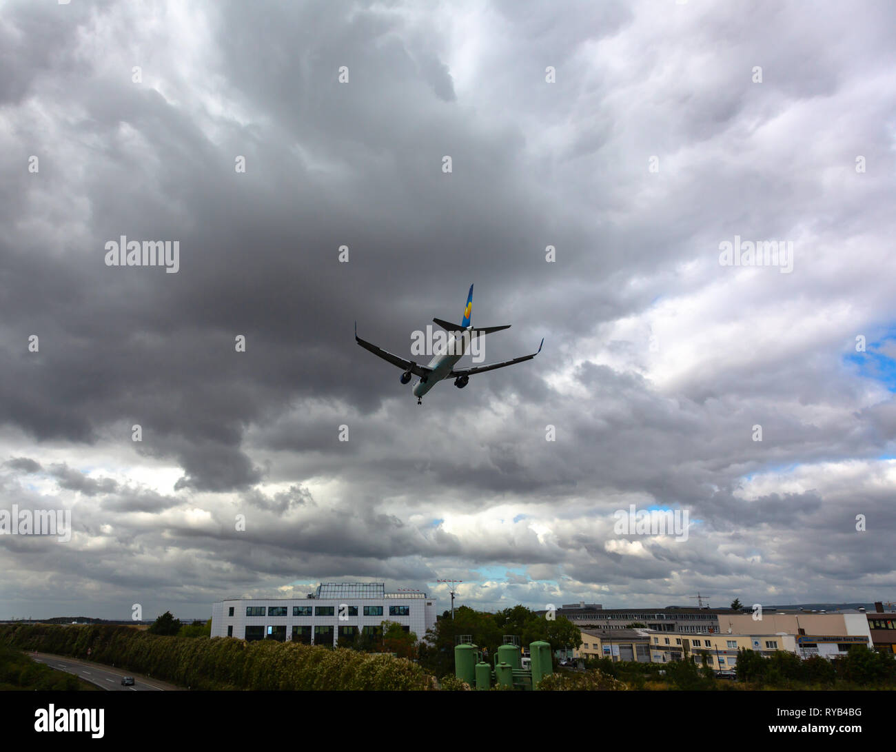 GERMANY, FRANKFURT - SEPTEMBER 06, 2015: Boeing 767-330, D-ABUF of Condor landing in a thunderstorm at Frankfurt Airport Stock Photo