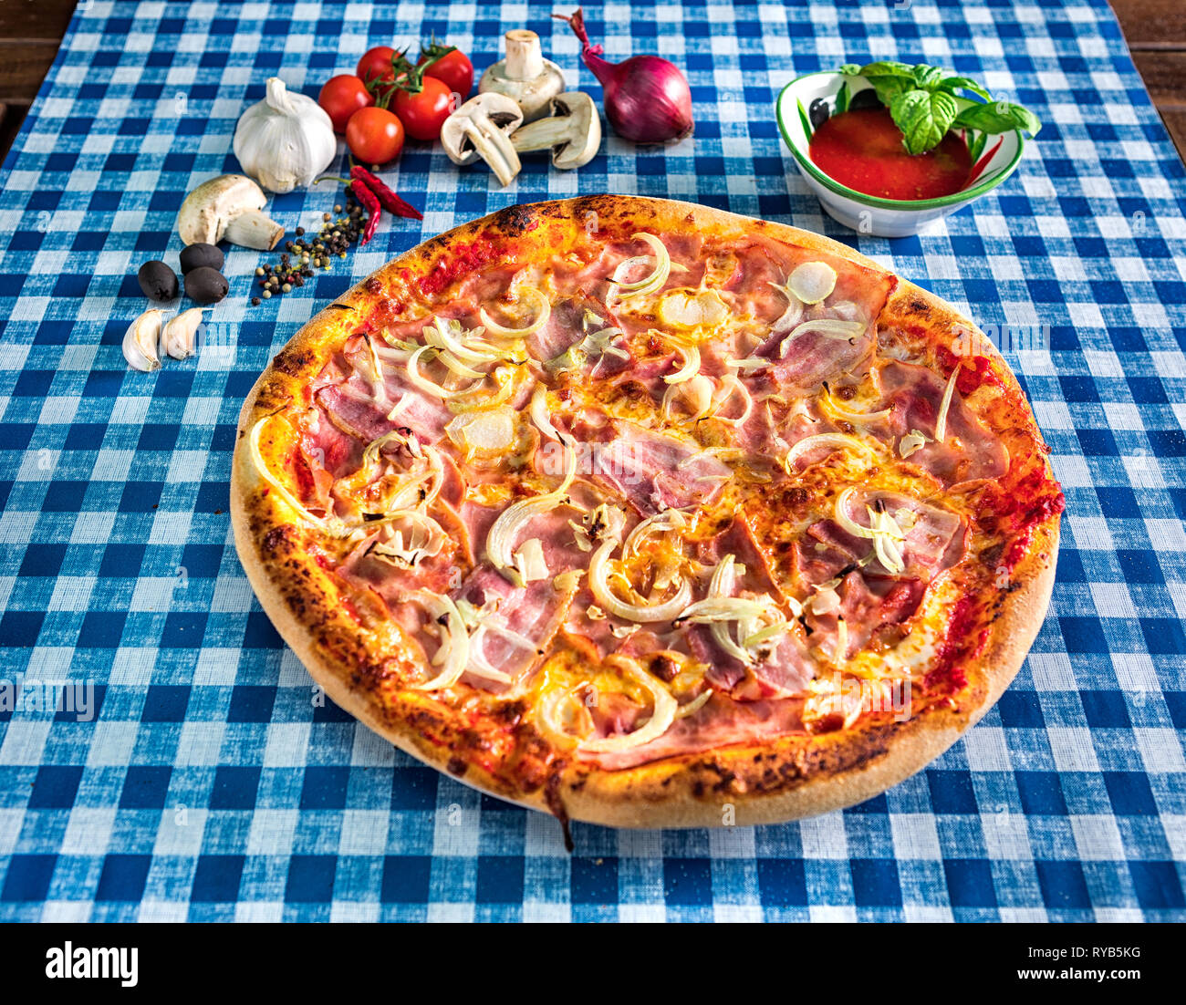 Bacon and cheese pizza with onion Stock Photo - Alamy