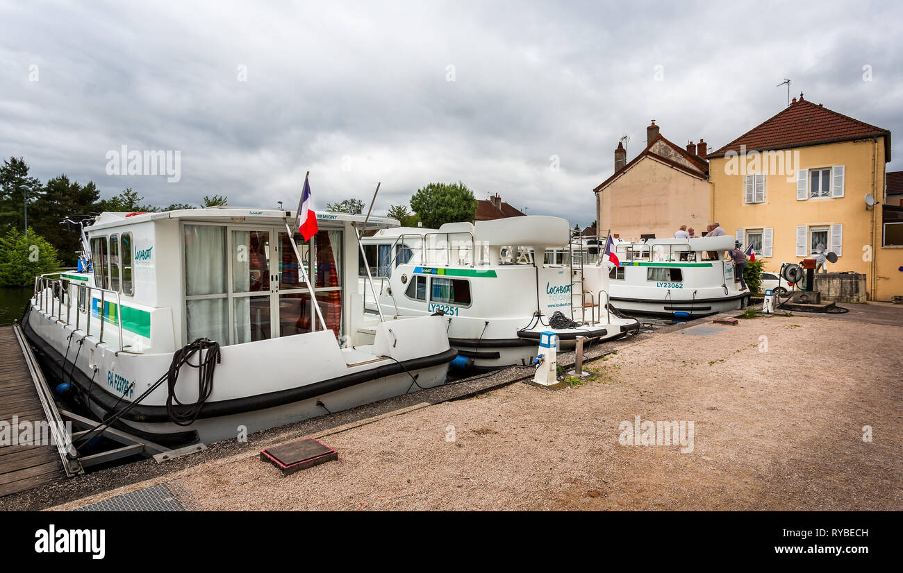 Holiday river boats for rent on the canal du centre at St Leger sur Dheune, Burgundy, France on 4 June 2016 Stock Photo