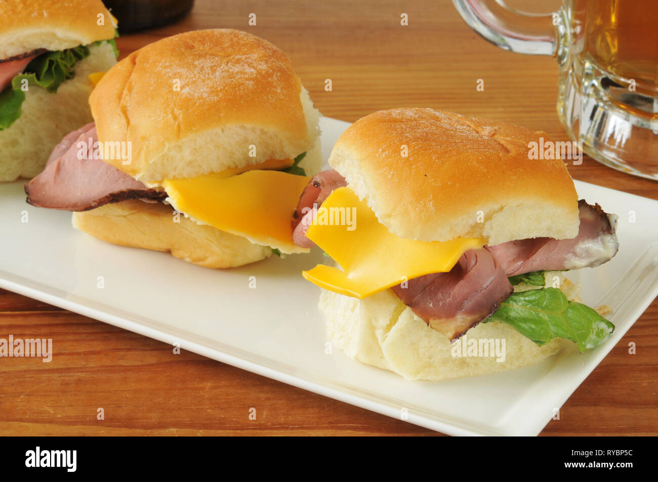 Roast beef sliders and beer on a bar counter Stock Photo